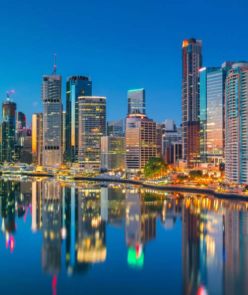 Brisbane CBD skyline reflected in the Brisbane River at dusk