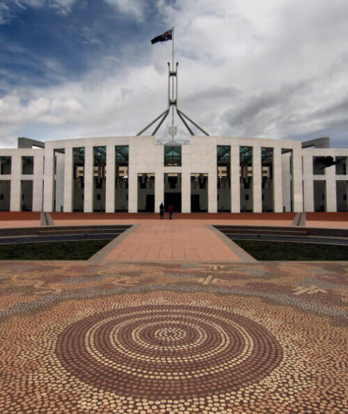 Front entrance of Parliament House Canberra with Indigenous mosaic forecourt