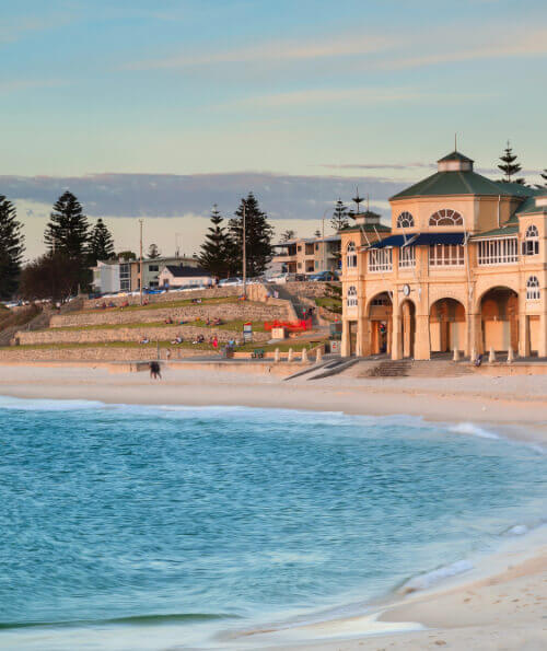 Cottesloe Beach pavilion and turquoise water at sunset in Perth